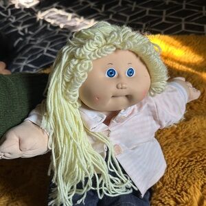 Charming Blonde Doll with Blue Eyes